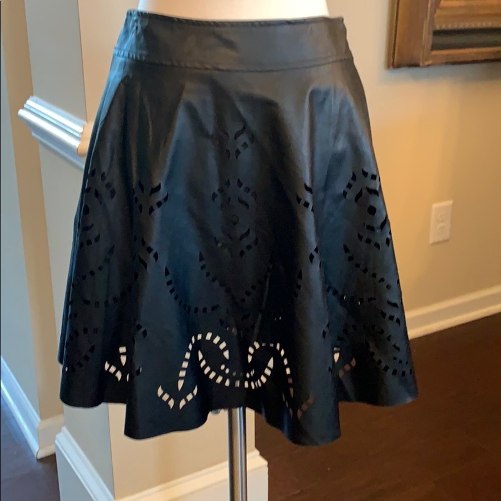 Black faux leather laser cut skirt
